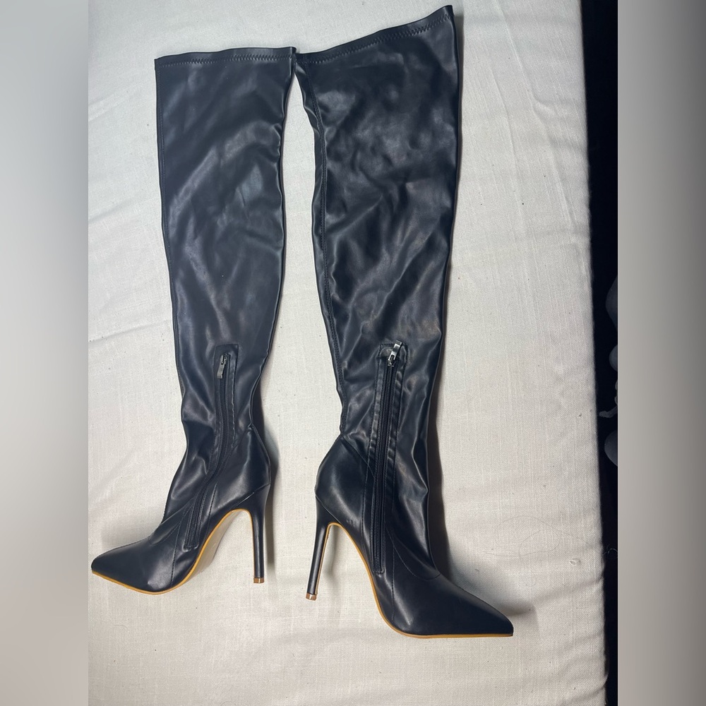 Black Stiletto over the Knee-High Boots